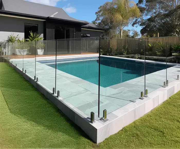 Backyard in Geelong with outdoor pool with glass pool fence