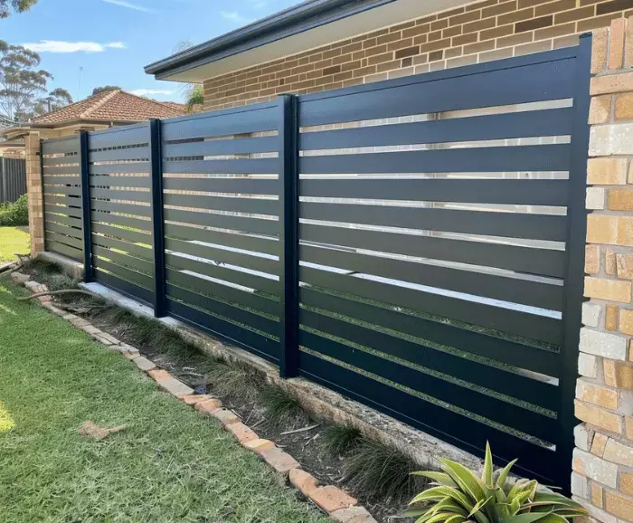 Front yard with aluminium slat fence in Geelong